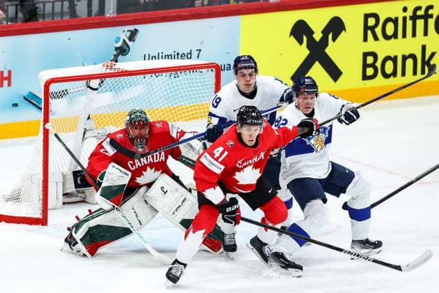 Ice hockey, Eishockey - IIHF WC 2025 STOCKHOLM,SWEDEN,19.MAY.25 - ICE HOCKEY - IIHF Ice Hockey World Championship, WM, Weltmeisterschaft 2025, group stage, Canada vs Finland. Image shows Marc-Andre Fleury (CAN), Ryker Evans (CAN), Waltteri Merela (FIN) and Harri Pesonen (FIN).  GEPAxpictures xMaticxKlansek