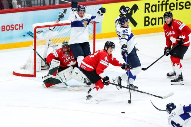 Ice hockey, Eishockey - IIHF WC 2025 STOCKHOLM,SWEDEN,19.MAY.25 - ICE HOCKEY - IIHF Ice Hockey World Championship, WM, Weltmeisterschaft 2025, group stage, Canada vs Finland. Image shows Marc-Andre Fleury (CAN), Waltteri Merela (FIN), Ryker Evans (CAN), Harri Pesonen (FIN) and Nate MacKinnon (CAN). GEPAxpictures xMaticxKlansek