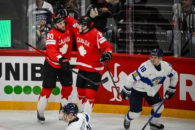 STOCKHOLM, SWEDEN 20250519 Canadas Ryan O Reilly 90 celebrates scoring the opening goal with teammate Noah Dobson during the IIHF Ice Hockey World Championship group A match between Canada and Finland at Avicii Arena in Stockholm, Sweden, on May 19, 2025 STOCKHOLM SWEDEN x10080x  Copyright: xFredrikxSandberg TTx ICE HOCKEY WC CANADA-FINLAND
