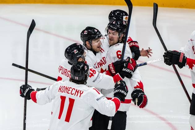 250520 Nathan MacKinnon and Travis Sanheim of Canada celebrate after 0 1 during the 2025 IIHF Ice Hockey World Championship group stage game between Sweden and Canada on May 20, 2025 in Stockholm Photo Simon Hastegard BILDBYRAN kod SH JM0689 ishockey ice hockey ishockey vm 2025 vm 2025 iihf world championship sverige sweden kanada canada bbeng gruppspel jubel  Copyright: SIMONxHASTEGARD BB250520SH004