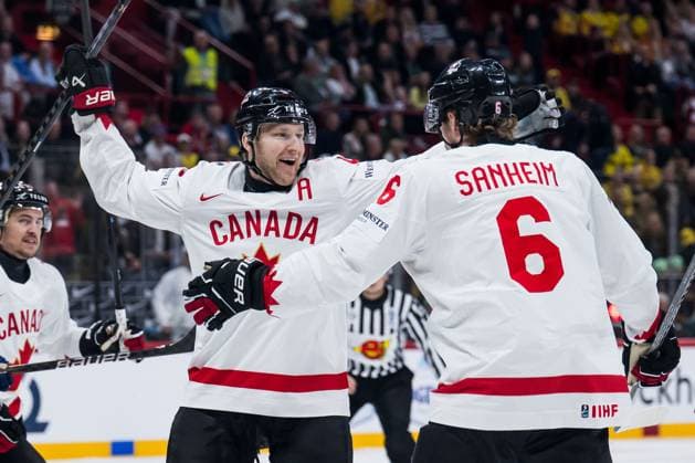 250520 Nathan MacKinnon and Travis Sanheim of Canada celebrate after 0 1 during the 2025 IIHF Ice Hockey World Championship group stage game between Sweden and Canada on May 20, 2025 in Stockholm Photo Joel Marklund BILDBYRAN kod JM JM0689 ishockey ice hockey ishockey vm 2025 vm 2025 iihf world championship sverige sweden kanada canada bbeng gruppspel jubel  Copyright: JOELxMARKLUND BB250520JM009