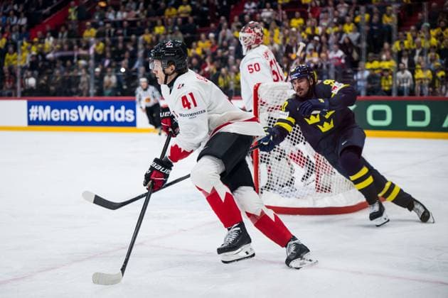 250520 Ryker Evans of Canada and Marcus Johansson of Sweden during the 2025 IIHF Ice Hockey World Championship group stage game between Sweden and Canada on May 20, 2025 in Stockholm Photo Maxim Thore BILDBYRAN kod MT JM0689 ishockey ice hockey ishockey vm 2025 vm 2025 iihf world championship sverige sweden kanada canada canada kanada bbeng gruppspel bbauto  Copyright: MAXIMxTHORE BB250520MT059