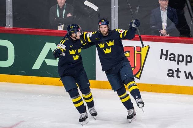 250520 Mikael Backlund and Elias Lindholm of Sweden celebrate after 1 1 during the 2025 IIHF Ice Hockey World Championship group stage game between Sweden and Canada on May 20, 2025 in Stockholm Photo Simon Hastegard BILDBYRAN kod SH JM0689 ishockey ice hockey ishockey vm 2025 vm 2025 iihf world championship sverige sweden kanada canada bbeng gruppspel jubel  Copyright: SIMONxHASTEGARD BB250520SH006
