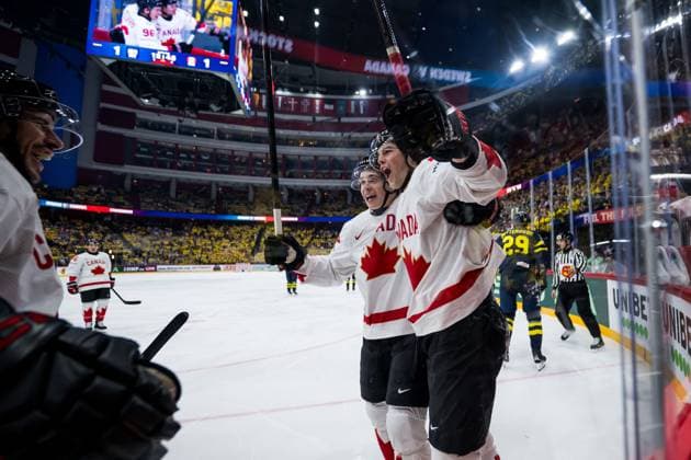250520 Noah Dobson, Macklin Celebrini and Tyson Foerster of Canada celebrate after 1 2 during the 2025 IIHF Ice Hockey World Championship group stage game between Sweden and Canada on May 20, 2025 in Stockholm Photo Joel Marklund BILDBYRAN kod JM JM0689 ishockey ice hockey ishockey vm 2025 vm 2025 iihf world championship sverige sweden kanada canada bbeng gruppspel jubel  Copyright: JOELxMARKLUND BB250520JM012