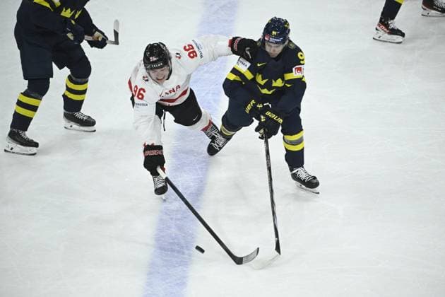 STOCKHOLM, SWEDEN 20250520 Canada s Macklin Celebrini and Sweden s Leo Carlsson during the IIHF Ice Hockey World Championship group A match between Sweden and Canada at Avicii Arena in Stockholm, Sweden, on May 20, 2025 STOCKHOLM SWEDEN x10080x  Copyright: xFredrikxSandberg TTx ICE HOCKEY WC SWEDEN-CANADA