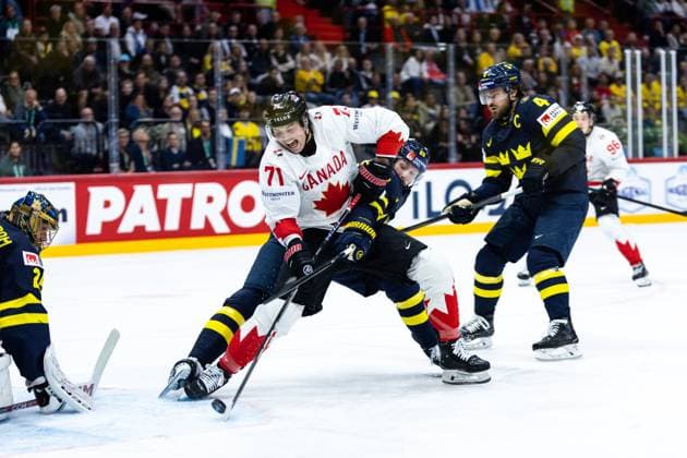 Ice hockey, Eishockey - IIHF WC 2025 STOCKHOLM,SWEDEN,20.MAY.25 - ICE HOCKEY - IIHF Ice Hockey World Championship, WM, Weltmeisterschaft 2025, group stage, Sweden vs Canada. Image shows Tyson Foerster (CAN) and Marcus Pettersson (SWE).  GEPAxpictures xMaticxKlansek