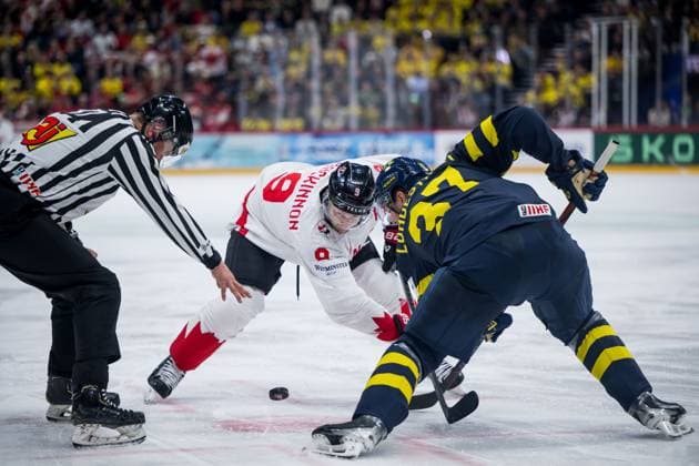250520 Nathan MacKinnon of Canada and Isac Lundeström of Sweden during the 2025 IIHF Ice Hockey World Championship group stage game between Sweden and Canada on May 20, 2025 in Stockholm Photo Maxim Thore BILDBYRAN kod MT JM0689 ishockey, ice hockey,ishockey vm 2025, vm, 2025 iihf world champ  Copyright: MAXIMxTHORE BB250520MT085