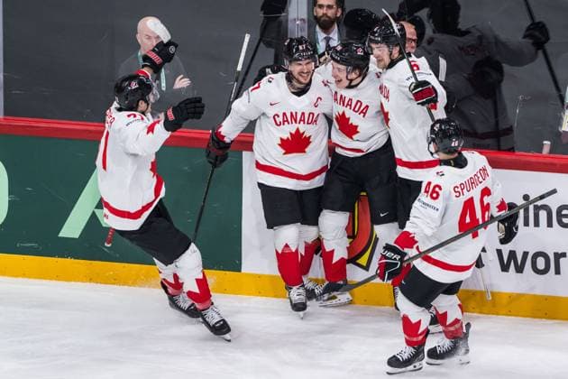 250520 Sidney Crosby, Macklin Celebrini and Travis Sanheim of Canada celebrate after 2 4 during the 2025 IIHF Ice Hockey World Championship group stage game between Sweden and Canada on May 20, 2025 in Stockholm Photo Simon Hastegard BILDBYRAN kod SH JM0689 ishockey ice hockey ishockey vm 2025 vm 2025 iihf world championship sverige sweden kanada canada bbeng gruppspel jubel  Copyright: SIMONxHASTEGARD BB250520SH021
