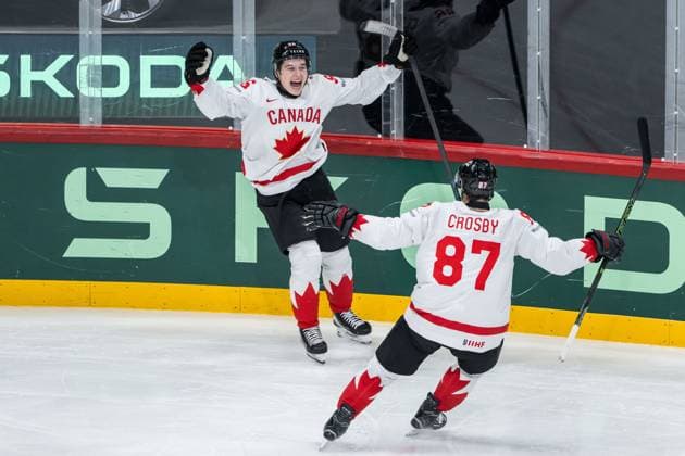 250520 Macklin Celebrini and Sidney Crosby of Canada celebrate after 2 4 during the 2025 IIHF Ice Hockey World Championship group stage game between Sweden and Canada on May 20, 2025 in Stockholm Photo Simon Hastegard BILDBYRAN kod SH JM0689 ishockey ice hockey ishockey vm 2025 vm 2025 iihf world championship sverige sweden kanada canada bbeng gruppspel jubel  Copyright: SIMONxHASTEGARD BB250520SH022
