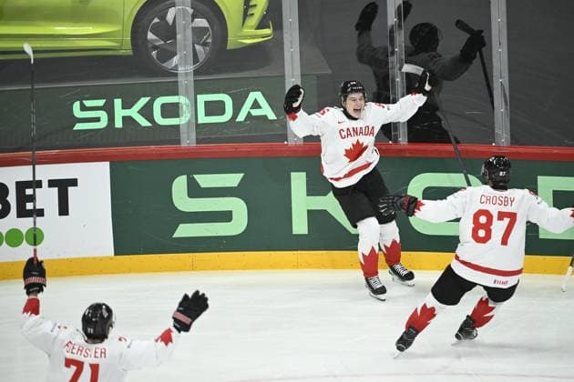 STOCKHOLM, SWEDEN 20250520 Canadas Macklin Celebrini 96, C celebrates with teammates after scoring during the IIHF Ice Hockey World Championship group A match between Sweden and Canada at Avicii Arena in Stockholm, Sweden, on May 20, 2025 STOCKHOLM SWEDEN x10080x  Copyright: xFredrikxSandberg TTx ICE HOCKEY WC SWEDEN-CANADA