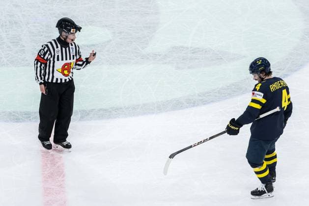 250520 Referee Mikko Kaukokari and Rasmus Andersson of Sweden during the 2025 IIHF Ice Hockey World Championship group stage game between Sweden and Canada on May 20, 2025 in Stockholm Photo Simon Hastegard BILDBYRAN kod SH JM0689 ishockey ice hockey ishockey vm 2025 vm 2025 iihf world championship sverige sweden kanada canada bbeng gruppspel  Copyright: SIMONxHASTEGARD BB250520SH029
