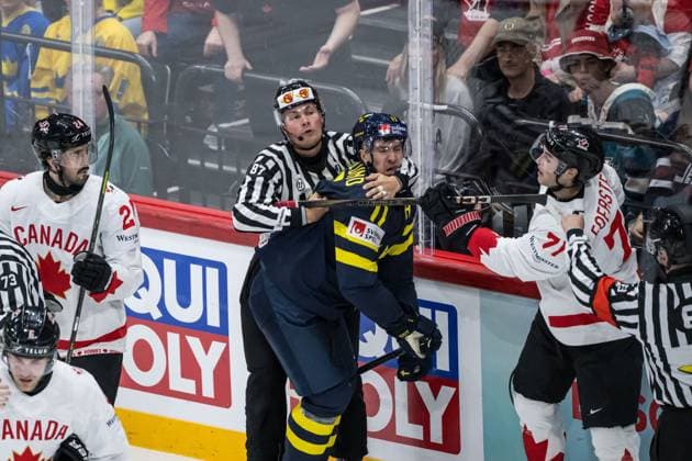 250520 Mikael Backlund of Sweden and Tyson Foerster of Canada during the 2025 IIHF Ice Hockey World Championship group stage game between Sweden and Canada on May 20, 2025 in Stockholm Photo Simon Hastegard BILDBYRAN kod SH JM0689 ishockey ice hockey ishockey vm 2025 vm 2025 iihf world championship sverige sweden kanada canada bbeng gruppspel  Copyright: SIMONxHASTEGARD BB250520SH030