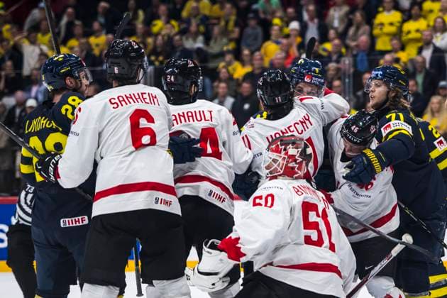250520 Travis Konecny of Canada and Filip Forsberg of Sweden during the 2025 IIHF Ice Hockey World Championship group stage game between Sweden and Canada on May 20, 2025 in Stockholm Photo Maxim ThorÃ BILDBYRAN kod MT JM0689 ishockey ice hockey ishockey vm 2025 vm 2025 iihf world championship sverige sweden kanada canada bbeng gruppspel  Copyright: MAXIMxTHORE BB250520MT117