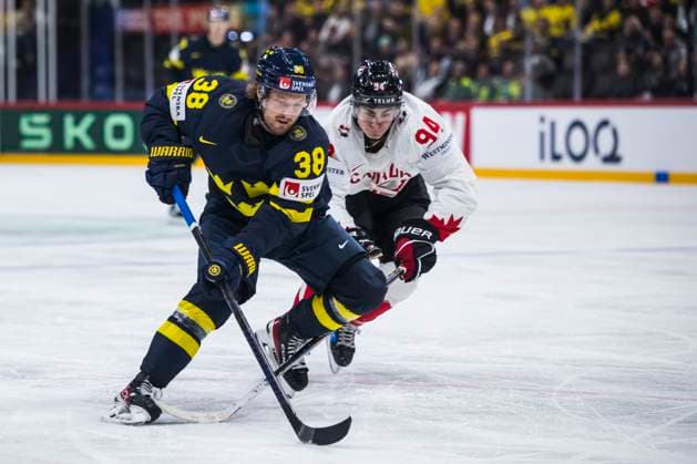 250520 Rasmus Sandin of Sweden and Porter Martone of Canada during the 2025 IIHF Ice Hockey World Championship group stage game between Sweden and Canada on May 20, 2025 in Stockholm Photo Maxim ThorÃ BILDBYRAN kod MT JM0689 ishockey ice hockey ishockey vm 2025 vm 2025 iihf world championship sverige sweden kanada canada bbeng gruppspel  Copyright: MAXIMxTHORE BB250520MT120