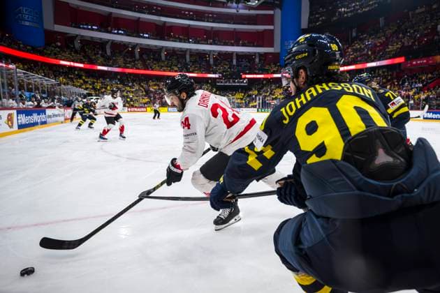 250520 Phillip Danault of Canada and Marcus Johansson of Sweden during the 2025 IIHF Ice Hockey World Championship group stage game between Sweden and Canada on May 20, 2025 in Stockholm Photo Maxim ThorÃ BILDBYRAN kod MT JM0689 ishockey ice hockey ishockey vm 2025 vm 2025 iihf world championship sverige sweden kanada canada bbeng gruppspel  Copyright: MAXIMxTHORE BB250520MT122
