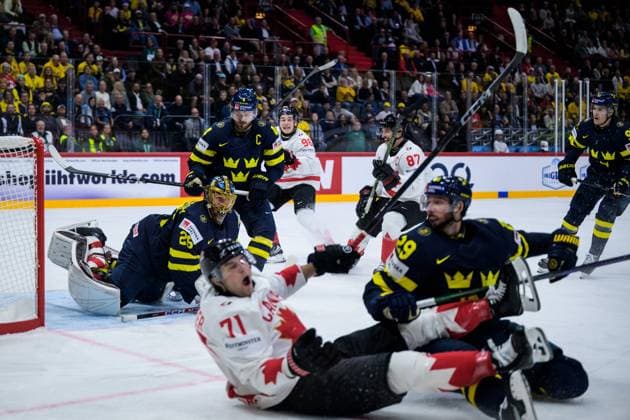250520 Goaltender Jacob Markström, Rasmus Andersson, Marcus Pettersson and Leo Carlsson of Sweden look dejected when Tyson Foerster, Macklin Celebrini and Sidney Crosby of Canada celebrate the 1 2 goal during the 2025 IIHF Ice Hockey World Championship group stage game between Sweden and Canada on May 20, 2025 in Stockholm Photo Joel Marklund BILDBYRAN kod JM JM0689 ishockey ice hockey ishockey vm 2025 vm 2025 iihf world championship sverige sweden kanada canada bbeng gruppspel depp jubel  Copyright: JOELxMARKLUND BB250520JM089