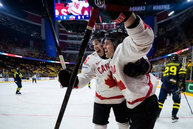 250520 Macklin Celebrini and Tyson Foerster of Canada celebrate the 1 2 goal during the 2025 IIHF Ice Hockey World Championship group stage game between Sweden and Canada on May 20, 2025 in Stockholm Photo Joel Marklund BILDBYRAN kod JM JM0689 ishockey ice hockey ishockey vm 2025 vm 2025 iihf world championship sverige sweden kanada canada bbeng gruppspel jubel  Copyright: JOELxMARKLUND BB250520JM091