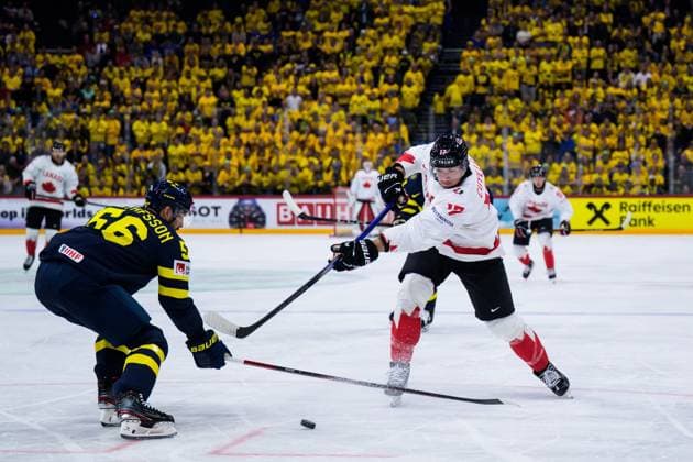 250520 Erik Gustafsson of Sweden and Will Cuylle of Canada during the 2025 IIHF Ice Hockey World Championship group stage game between Sweden and Canada on May 20, 2025 in Stockholm Photo Joel Marklund BILDBYRAN kod JM JM0689 ishockey ice hockey ishockey vm 2025 vm 2025 iihf world championship sverige sweden kanada canada bbeng gruppspel  Copyright: JOELxMARKLUND BB250520JM093