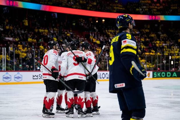250520 Nathan MacKinnon of Canada celebrates with teammates after scoring the 2 5 goal during the 2025 IIHF Ice Hockey World Championship group stage game between Sweden and Canada on May 20, 2025 in Stockholm Photo Joel Marklund BILDBYRAN kod JM JM0689 ishockey ice hockey ishockey vm 2025 vm 2025 iihf world championship sverige sweden kanada canada bbeng gruppspel jubel  Copyright: JOELxMARKLUND BB250520JM100