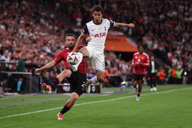 Bilbao, Spain, 21st May 2025. Luke Shaw of Manchester United, ManU and Brennan Johnson of Tottenham challenge for the ball during the Tottenham Hotspur vs Manchester United UEFA Europa League Final match at San Mames, Bilbao. Picture credit should read: David Klein Sportimage EDITORIAL USE ONLY. No use with unauthorised audio, video, data, fixture lists, club league logos or live services. Online in-match use limited to 120 images, no video emulation. No use in betting, games or single club league player publications. SPI_078_DK_Tottenham_Man_Utd SPI-3943-0078