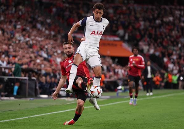 Bilbao, Spain, 21st May 2025. Luke Shaw of Manchester United, ManU and Brennan Johnson of Tottenham challenge for the ball during the Tottenham Hotspur vs Manchester United UEFA Europa League Final match at San Mames, Bilbao. Picture credit should read: David Klein Sportimage EDITORIAL USE ONLY. No use with unauthorised audio, video, data, fixture lists, club league logos or live services. Online in-match use limited to 120 images, no video emulation. No use in betting, games or single club league player publications. SPI_079_DK_Tottenham_Man_Utd SPI-3943-0079