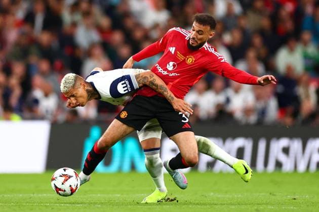 Richarlison of Tottenham Hotspur and Noussair Mazraoui of Manchester United, ManU Tottenham Hotspur v Manchester United, Europa League Final, Football, San Mames Stadium, Bilbao, Spain - 21 May 2025 EDITORIAL USE ONLY No use with unauthorised audio, video, data, fixture lists, club league logos or live services. Online in-match use limited to 120 images, no video emulation. No use in betting, games or single club league player publications.  Copyright: xJamesxMarsh Shutterstockx 15312890cv