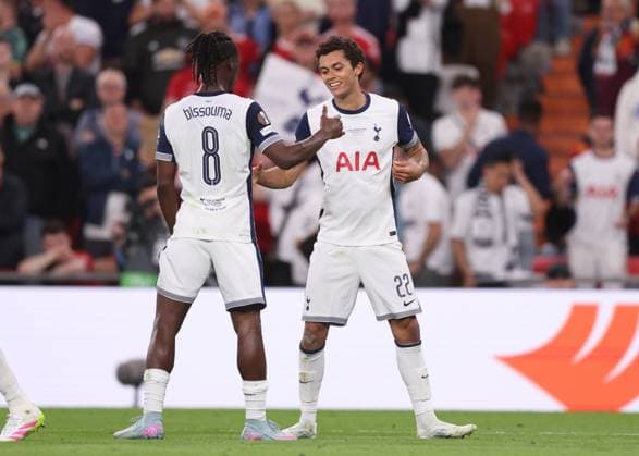 Bilbao, Spain, 21st May 2025. Brennan Johnson (R) of Tottenham celebrates after Luke Shaw (not pictured) of Manchester United, ManU scores an own goal to make it 1-0 during the Tottenham Hotspur vs Manchester United UEFA Europa League Final match at San Mames, Bilbao. Picture credit should read: David Klein Sportimage EDITORIAL USE ONLY. No use with unauthorised audio, video, data, fixture lists, club league logos or live services. Online in-match use limited to 120 images, no video emulation. No use in betting, games or single club league player publications. SPI_112_DK_Tottenham_Man_Utd SPI-3943-0112