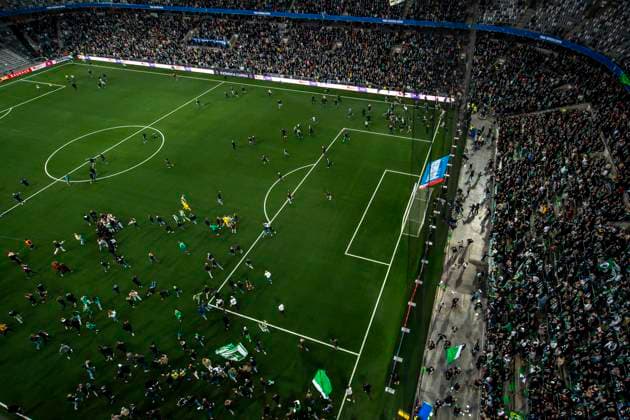 250521 Hammarby supporters storm the pitch after the final of the Swedish Cup between Hammarby and IFK Norrköping on May 21, 2025 in Stockholm  Copyright: MAXIMxTHORE BB250521MT131