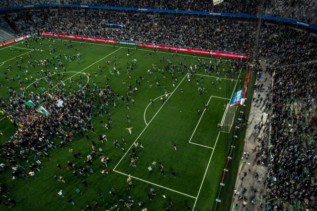 250521 Hammarby supporters storm the pitch after the final of the Swedish Cup between Hammarby and IFK Norrköping on May 21, 2025 in Stockholm  Copyright: MAXIMxTHORE BB250521MT133