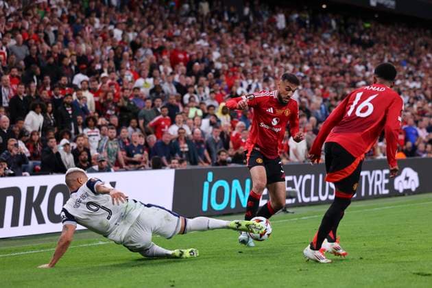 May 21, 2025, Bilbao, Vizcaya, Spain: Noussair Mazraoui of Manchester United, ManU and Richarlison de Andrade of Tottenham in action during the Final UEFA Europa League football match played between Tottenham Hotspur FC and Manchester United at San Mames stadium on May 21, 2025, in Bilbao, Vizcaya, Spain. Bilbao Spain - ZUMAa181 20250521_zaa_a181_042 Copyright: xDennisxAgyemanx
