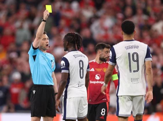 Bilbao, Spain, 21st May 2025. Yves Bissouma of Tottenham is shown a yellow card during the Tottenham Hotspur vs Manchester United, ManU UEFA Europa League Final match at San Mames, Bilbao. Picture credit should read: David Klein Sportimage EDITORIAL USE ONLY. No use with unauthorised audio, video, data, fixture lists, club league logos or live services. Online in-match use limited to 120 images, no video emulation. No use in betting, games or single club league player publications. SPI_147_DK_Tottenham_Man_Utd SPI-3943-0150
