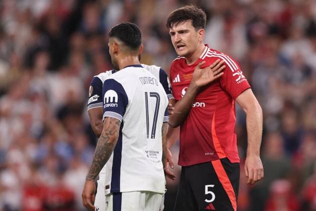 Bilbao, Spain, 21st May 2025. Cristian Romero of Tottenham and Harry Maguire of Manchester United, ManU clash during the Tottenham Hotspur vs Manchester United UEFA Europa League Final match at San Mames, Bilbao. Picture credit should read: David Klein Sportimage EDITORIAL USE ONLY. No use with unauthorised audio, video, data, fixture lists, club league logos or live services. Online in-match use limited to 120 images, no video emulation. No use in betting, games or single club league player publications. SPI_154_DK_Tottenham_Man_Utd SPI-3943-0157