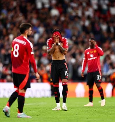Leny Yoro of Manchester United, ManU and team mates look dejected. Tottenham Hotspur v Manchester United, Europa League Final, Football, San Mames Stadium, Bilbao, Spain - 21 May 2025 EDITORIAL USE ONLY No use with unauthorised audio, video, data, fixture lists, club league logos or live services. Online in-match use limited to 120 images, no video emulation. No use in betting, games or single club league player publications.  Copyright: xJamesxMarsh Shutterstockx 15312890gg