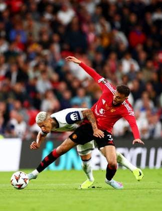 Richarlison of Tottenham Hotspur and Noussair Mazraoui of Manchester United, ManU Tottenham Hotspur v Manchester United, Europa League Final, Football, San Mames Stadium, Bilbao, Spain - 21 May 2025 EDITORIAL USE ONLY No use with unauthorised audio, video, data, fixture lists, club league logos or live services. Online in-match use limited to 120 images, no video emulation. No use in betting, games or single club league player publications.  Copyright: xJamesxMarsh Shutterstockx 15312890gi