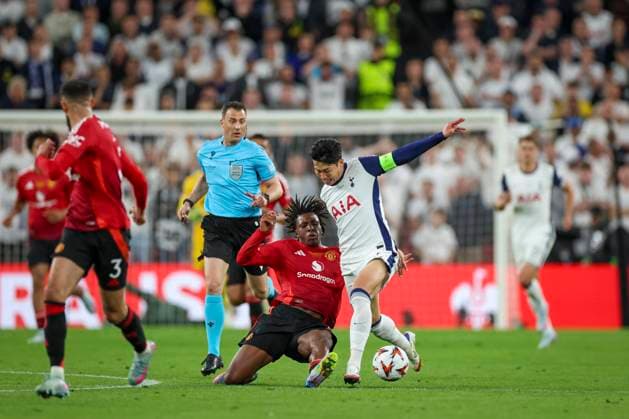 Tottenham Hotspur FC v Manchester United, ManU FC Manchester United defender Patrick Dorgu (13) tackles Tottenham Hotspur forward Son Heung-Min (7) during the Tottenham Hotspur FC v Manchester United FC UEFA Europa League Final at the Estadio de San MamÃ s, Bilbao, Biscay, Spain on 21 May 2025 Credit: Phil Duncan Every Second Media Editorial use only. All images are copyright Every Second Media Limited. No images may be reproduced without prior permission. Copyright: xIMAGO EveryxSecondxMediax ESM-1482-0031 PhilxDuncanx xEveryxSecondxMediax