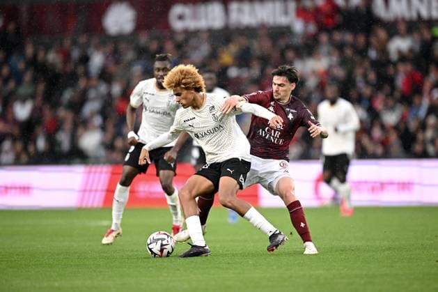 FC Metz v Stade de Reims - Playoffs Ligue 1 McDonald s Ligue 2 BKT 2024 2025, first leg 20 Jessy DEMINGUET (fcm) - 30 John PATRICK (sdr) during the playoffs match between Metz and Reims at Stade Saint-Symphorien on May 21, 2025 in Metz, France. Metz France  Copyright: xFEPx 776325767