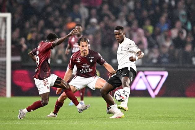 FC Metz v Stade de Reims - Playoffs Ligue 1 McDonald s Ligue 2 BKT 2024 2025, first leg 21 Benjamin STAMBOULI (fcm) - 72 Amadou KONE (sdr) during the playoffs match between Metz and Reims at Stade Saint-Symphorien on May 21, 2025 in Metz, France. Metz France  Copyright: xFEPx 776325767