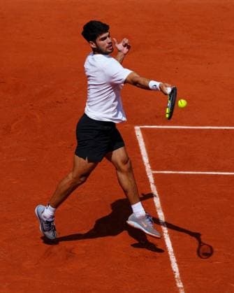 Carlos Alcaraz practices French Open Tennis, Thursday Previews, Qualifying and Practice, Tennis, Roland Garros, Paris, France - 22 May 2025 EDITORIAL USE ONLY No use with unauthorised audio, video, data, fixture lists, club league logos or live services. Online in-match use limited to 120 images, no video emulation. No use in betting, games or single club league player publications. Copyright: xJavierxGarcia Shutterstockx 15314609y