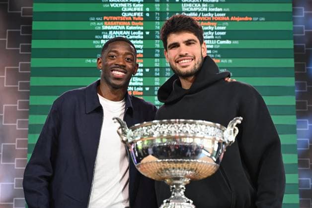 Ousmane Dembele and Carlos Alcaraz in front of the cups. Draw for the Roland Garros tennis tournament in the presence of Gilles Moretton, President of the French Tennis Federation and Amelie Mauresmo, Director of the Roland Garros Tournament, with Ousmane Dembele of PSG as guest of honor, on May 22, 2025. - 22 05 2025 - France Ile-de-France (region) Paris - Draw, Roland Garros 2025, in Paris on May 22, 2025 JulienxMattiax xLexPictorium  LePictorium_0308638.jpg