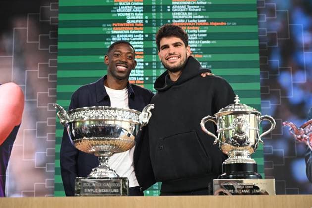 Ousmane Dembele and Carlos Alcaraz in front of the cups. Draw for the Roland Garros tennis tournament in the presence of Gilles Moretton, President of the French Tennis Federation and Amelie Mauresmo, Director of the Roland Garros Tournament, with Ousmane Dembele of PSG as guest of honor, on May 22, 2025. - 22 05 2025 - France Ile-de-France (region) Paris - Draw, Roland Garros 2025, in Paris on May 22, 2025 JulienxMattiax xLexPictorium  LePictorium_0308641.jpg