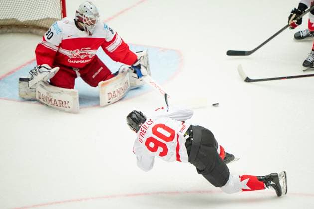 Denmark IIHF Hockey Worlds Canada vs Denmark Ryan O Reilly, Canada, right, challenges goalkeeper Frederik Dichow, Denmark during the quarter final match between Canada and Denmark at the IIHF Ice Hockey World Championships in Herning, Denmark, Thursday May 22, 2025 , Herning Denmark Mors  Copyright: BoxAmrstrupx xRitzauxScanpix BoxAmstrupx spdk20250522-210658-L