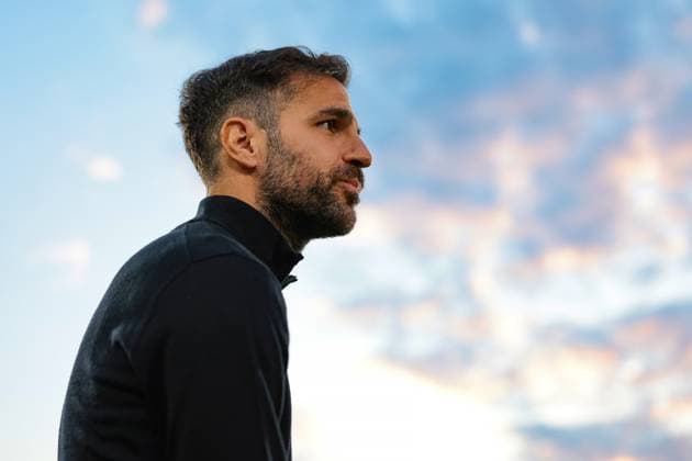 Como, Italy, 23rd May 2025. Cesc Fabregas Head coach of Como 1907 looks on prior to kick off in the Como 1907 vs Internazionale Serie A match at Stadio Giuseppe Sinigaglia, Como. Picture credit should read: Jonathan Moscrop Sportimage EDITORIAL USE ONLY. No use with unauthorised audio, video, data, fixture lists, club league logos or live services. Online in-match use limited to 120 images, no video emulation. No use in betting, games or single club league player publications. SPI_088_JM_COMO_INTER_ SPI-3947-0092