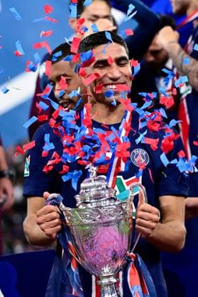 FOOTBALL : PSG vs Reims - Finale Coupe de France - 24 05 2025 Achraf Hakimi ( 2 - PSG ) celebrate with the French Cup trophy after the French Cup Final match between Paris Saint Germain and Stade de Reims at Stade de France on May 24 , 2025 in Saint Denis, France. ( Photo by Dante Badano PsnewZ ) - Saint DenisFrance  Copyright: xx
