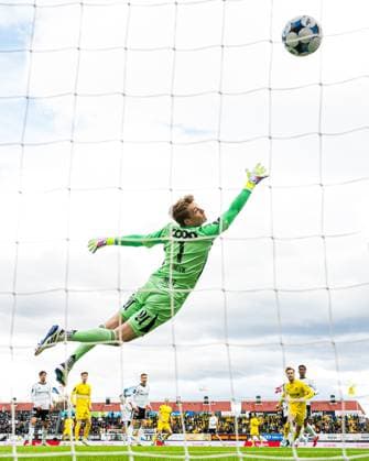 250524 Ulrik Saltnes of Bodo Glimt scores the 4 0 goal behind goalkeeper Sander Tangvik of Rosenborg during the Eliteserien match between Bodo Glimt and Rosenborg on May 24, 2025 in Bodo Photo Marius Simensen BILDBYRAN COP 238 bbeng bodo glimt eliteserien football fotball fotboll rosenborg soccer  Copyright: MARIUSxSIMENSEN BB250524ZI014