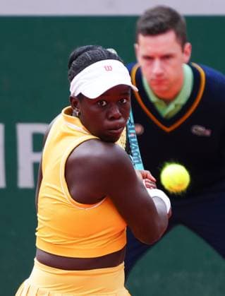 Victoria Mboko in first round action French Open Tennis, Day One, Tennis, Roland Garros, Paris, France - 25 May 2025 EDITORIAL USE ONLY No use with unauthorised audio, video, data, fixture lists, club league logos or live services. Online in-match use limited to 120 images, no video emulation. No use in betting, games or single club league player publications. Copyright: xJavierxGarcia Shutterstockx 15314618m