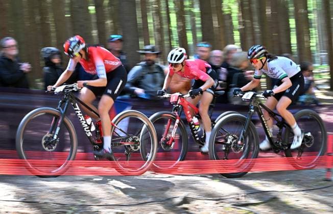 From left Alessandra Keller of Switzerland, Samara Maxwell of New Zealand, Candice Lill of Sauth Africa compete during women elite race during Mountain bike cross country World Cup event, Nove Mesto na Morave, Czech Republic, May 25, 2025. (CTKxPhoto LubosxPavlicek) CTKPhotoP2025052503638  CTKPhotoP2025052503638