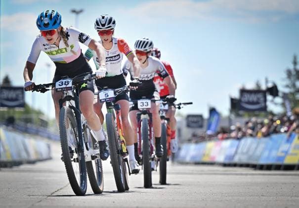 From left Zoe Cuthbert of Australia, Jolanda Neff of Switzerland, Emilly Johnston of Canada, Linda Indergand of Switzerland compete during women elite race during Mountain bike cross country World Cup event, Nove Mesto na Morave, Czech Republic, May 25, 2025. (CTKxPhoto LubosxPavlicek) CTKPhotoP2025052503649  CTKPhotoP2025052503649