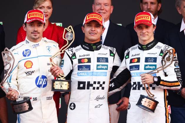 Sport Themen der Woche KW21 Sport Bilder des Tages F1 2025 Monaco Grand Prix Charles Leclerc of Ferrari, Lando Norris of McLaren and Oscar Piastri of McLaren celebrate on the podium during the F1 Grand Prix of Monaco at Circuit de Monaco on May 25, 2025 in Monte-Carlo, Monaco. Monte Carlo Monaco  Copyright: xBeataxZawrzelx originalFilename:zawrzel-f12025mo250525_npkyS.jpg