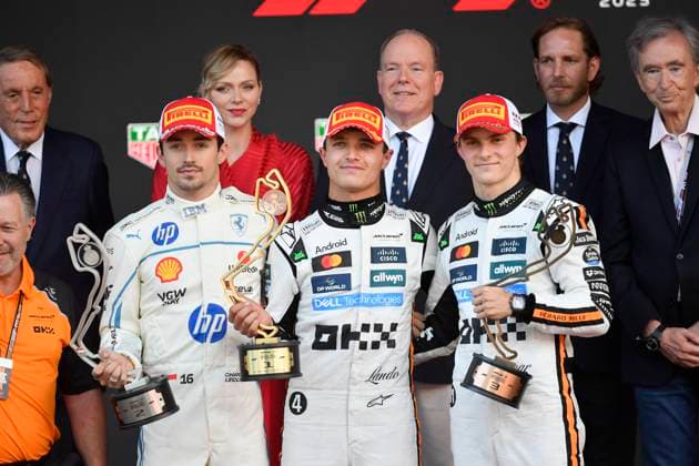 25th May 2025; Circuit de Monaco, Monte Carlo, Monaco; Formula 1 Tag Heuer Grand Prix of Monaco 2025; Race Day; 2nd placed Charles Leclerc of Monaco driving for Scuderia Ferrari HP F1 Team, winner Lando Norris of Great Britain driving for McLaren F1 Team, 3rd placed Oscar Piastri of Australia driving for McLaren F1 Team on the podium  ActionPlus12794098 BestxImages