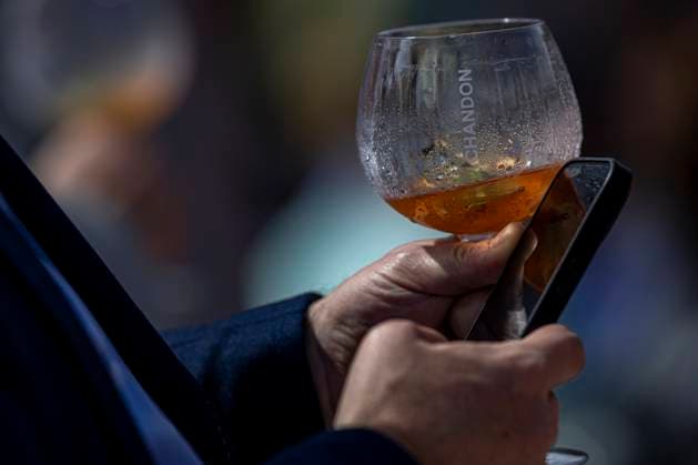 2025 French Open - Day One A spectator drinks during the match between Marton Fucsovics and Tristan Schoolkate at the Roland Garros Grand Slam Tournament in Paris, France, on May 25, 2025. Paris France  Copyright: xRobertxSzaniszlox originalFilename:szaniszlo-notitle250525_npr1F.jpg